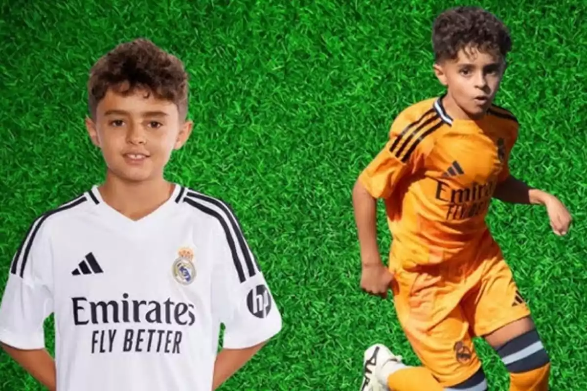 Dos niños con uniforme del Real Madrid posan sobre un fondo de césped artificial, uno de pie con camiseta blanca y otro en acción con uniforme naranja. Dos niños con uniforme del Real Madrid posan sobre un fondo de césped artificial, uno de pie con camiseta blanca y otro en acción con uniforme naranja.