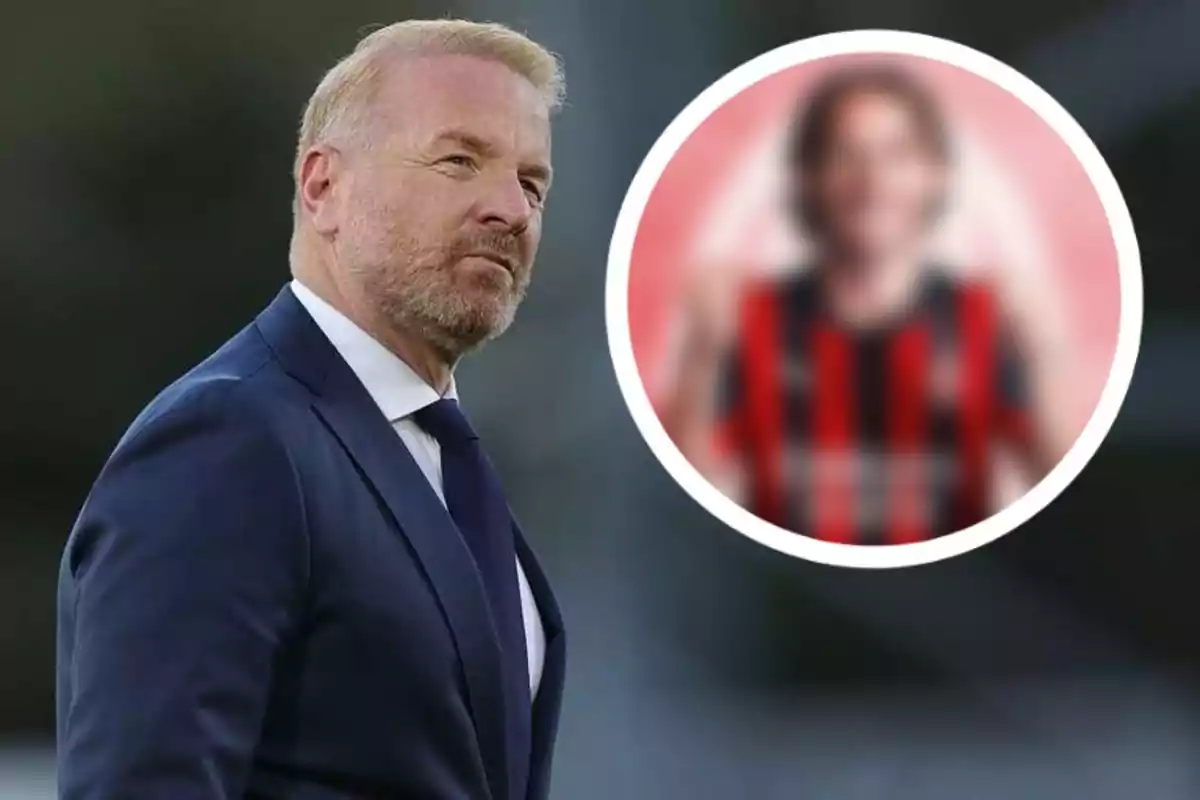 Man in a suit looking to the side with a blurred image of a person in a red and black striped jersey inside a white circle