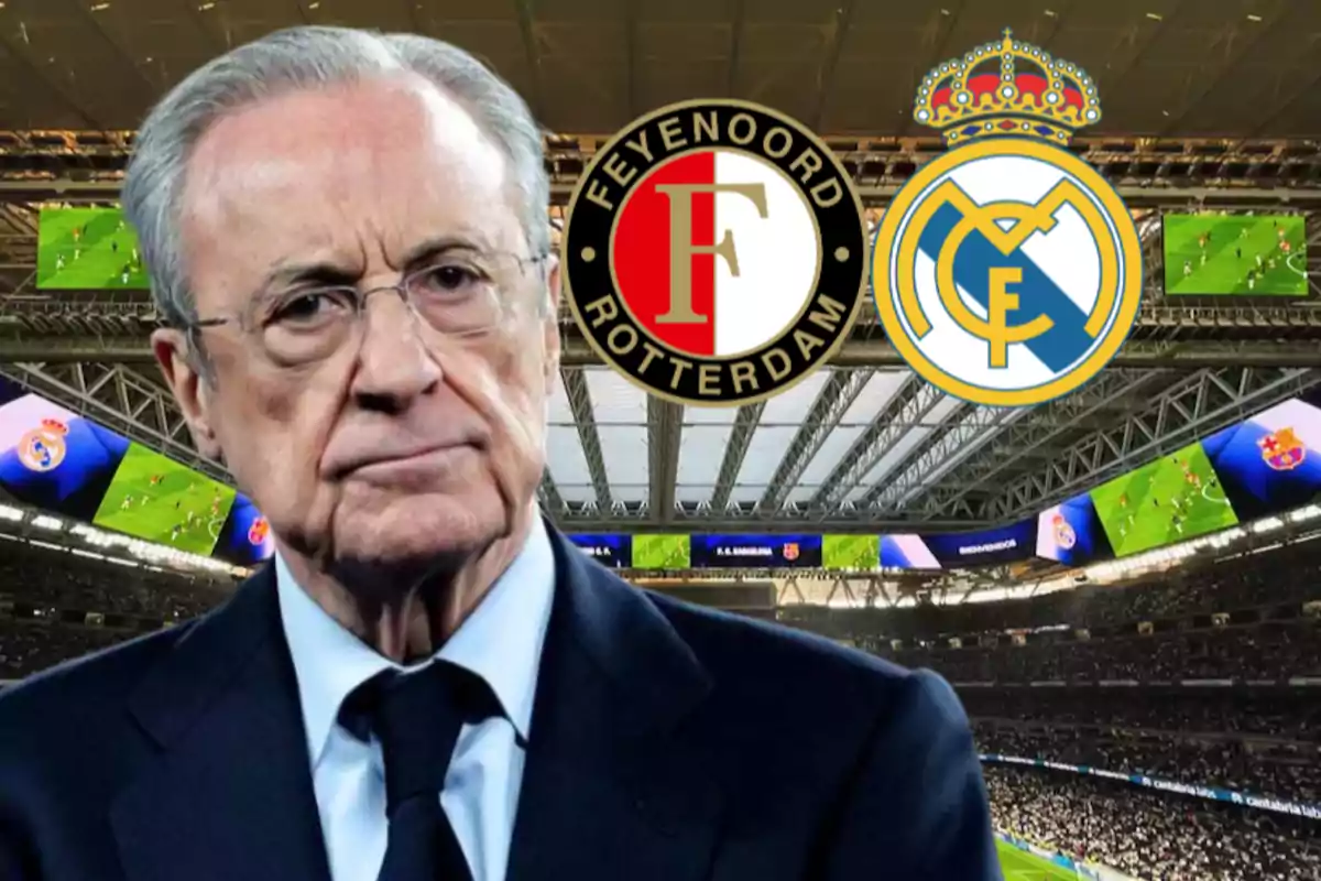 Hombre mayor con gafas y expresión seria en un estadio de fútbol con los escudos de Feyenoord y Real Madrid al fondo
