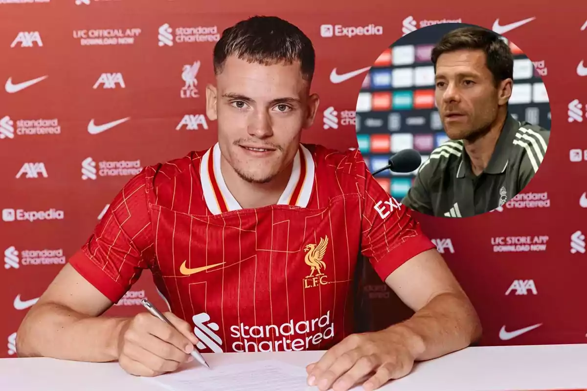 A player wearing a Liverpool jersey signs a contract while, in the background, an image of a coach at a press conference appears.