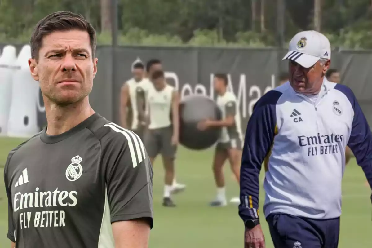 Entrenadores del Real Madrid en un campo de entrenamiento con jugadores al fondo