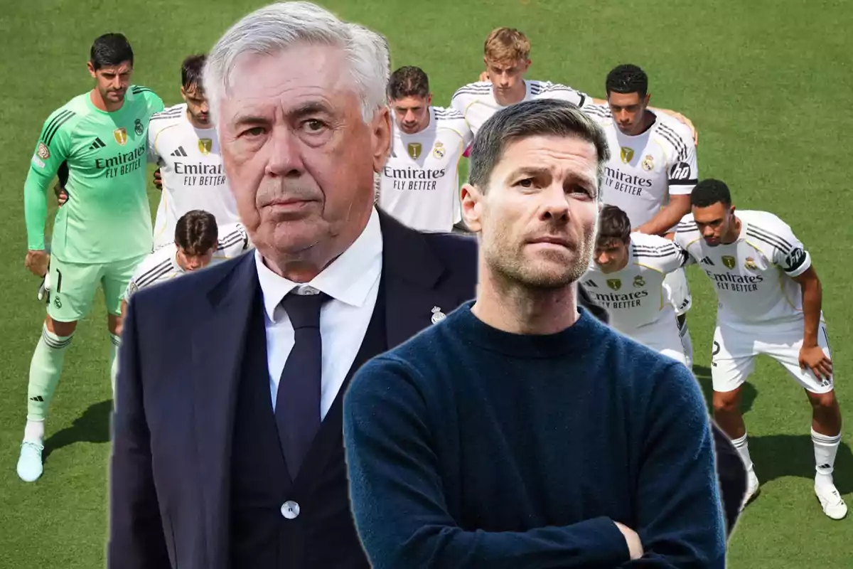 Two coaches in the foreground with Real Madrid players posing on the soccer field in the background