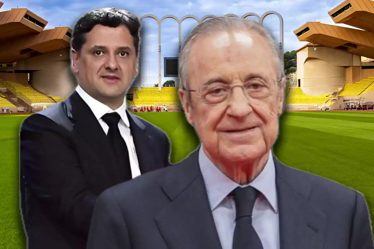 Dos hombres con traje posan en un estadio de fútbol con gradas amarillas y arquitectura moderna