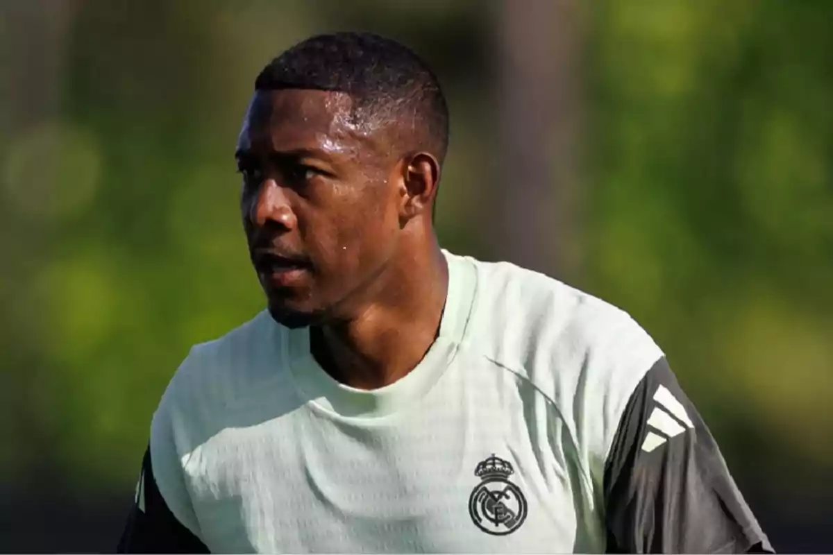 Soccer player wearing a Real Madrid training jersey during an outdoor practice Soccer player wearing a Real Madrid training jersey during an outdoor practice