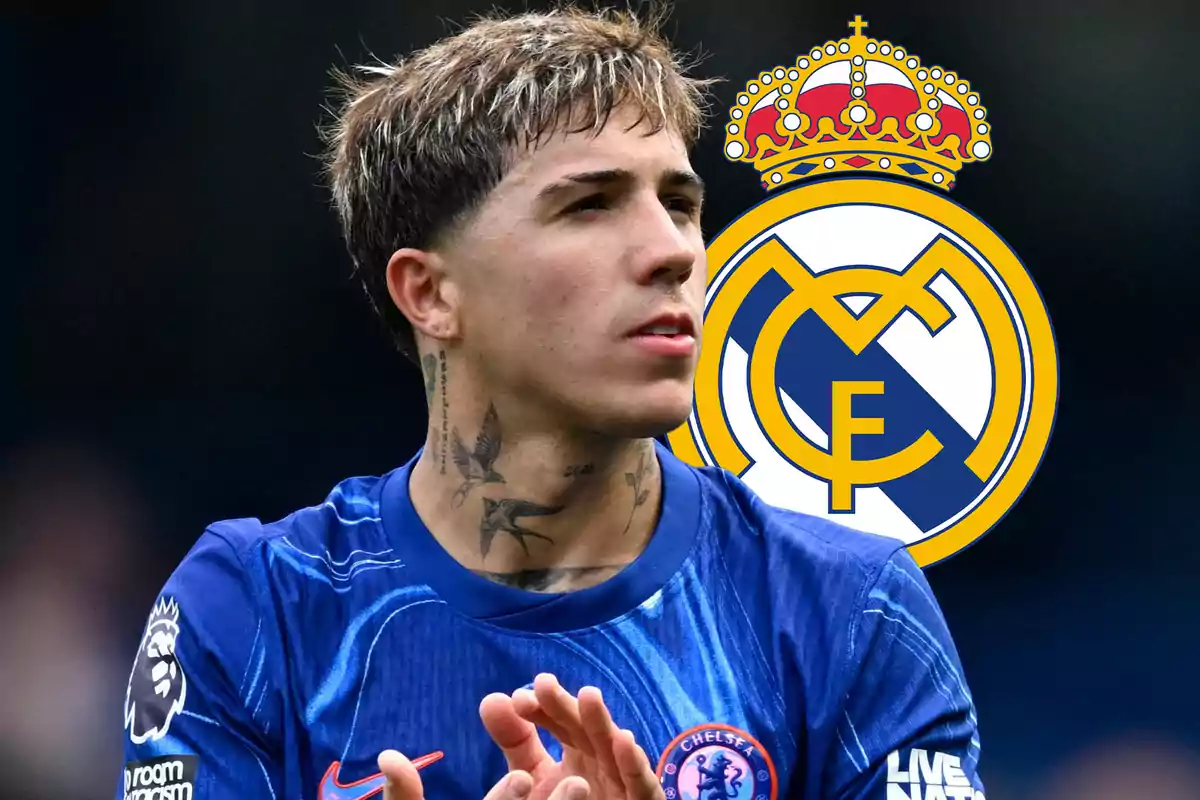 Soccer player in a Chelsea uniform applauding with the Real Madrid crest in the background