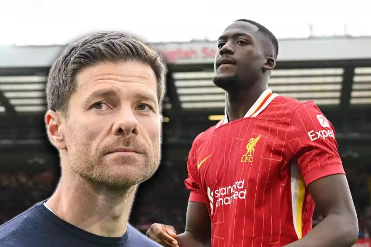 Two men, one wearing a Liverpool jersey and the other wearing a dark jersey, appear in a soccer stadium.