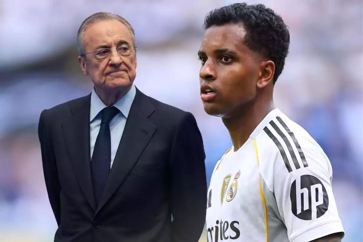 An older man in a dark suit watches a young player in a white Real Madrid uniform at a stadium.