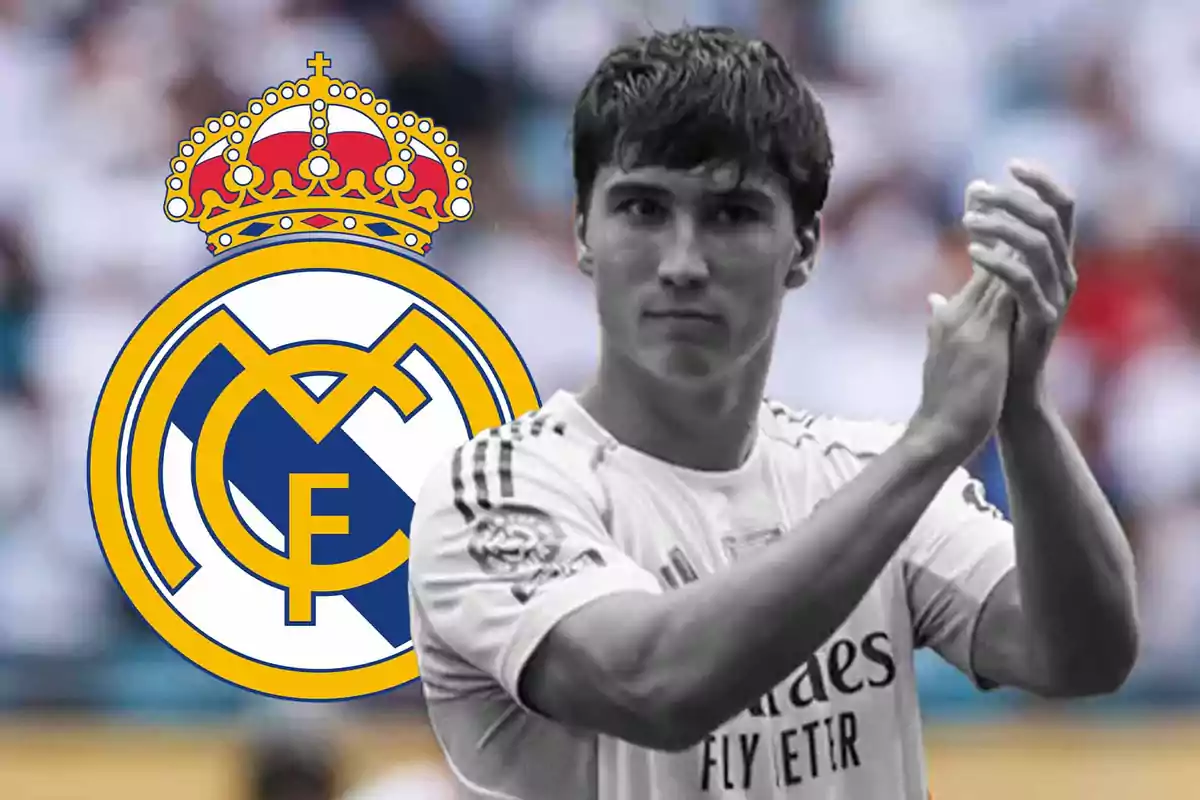 Real Madrid player applauding with the club’s crest in the background