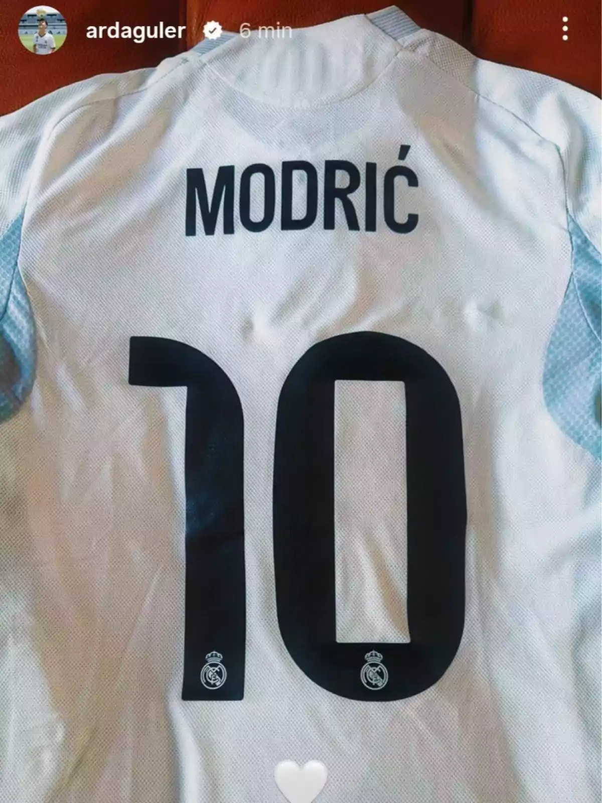 White Real Madrid jersey with the name Modric and the number 10 on the back White Real Madrid jersey with the name Modric and the number 10 on the back