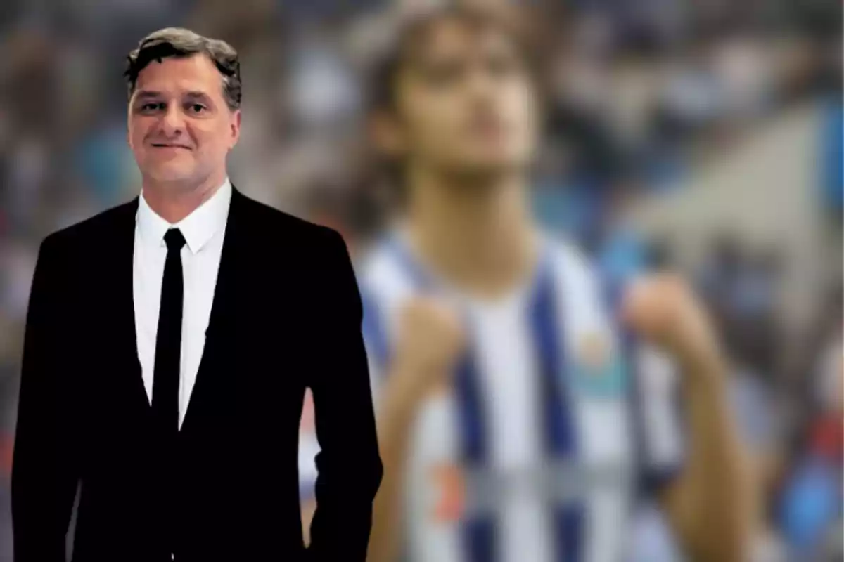 Man in a black suit and tie posing in front of a blurred background of a player wearing a blue and white striped uniform