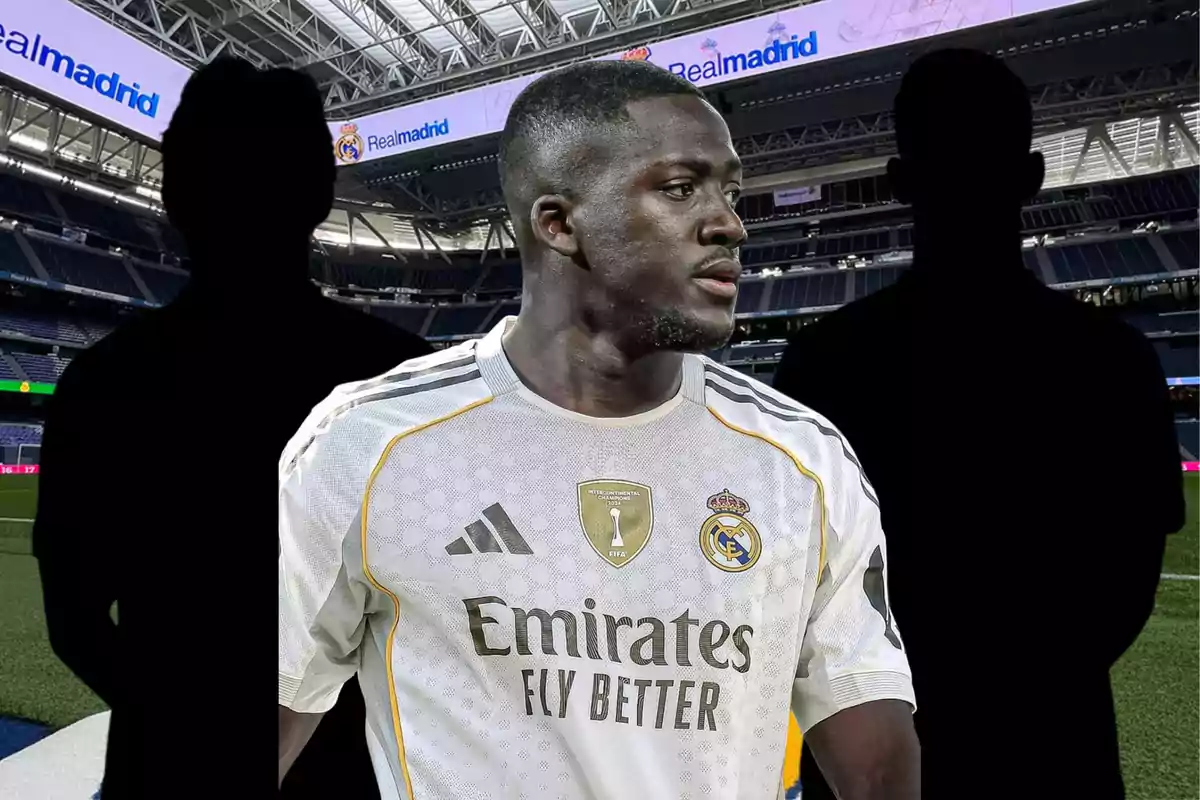 Real Madrid player in the foreground wearing the team’s white jersey, accompanied by three black silhouettes in the background inside a stadium