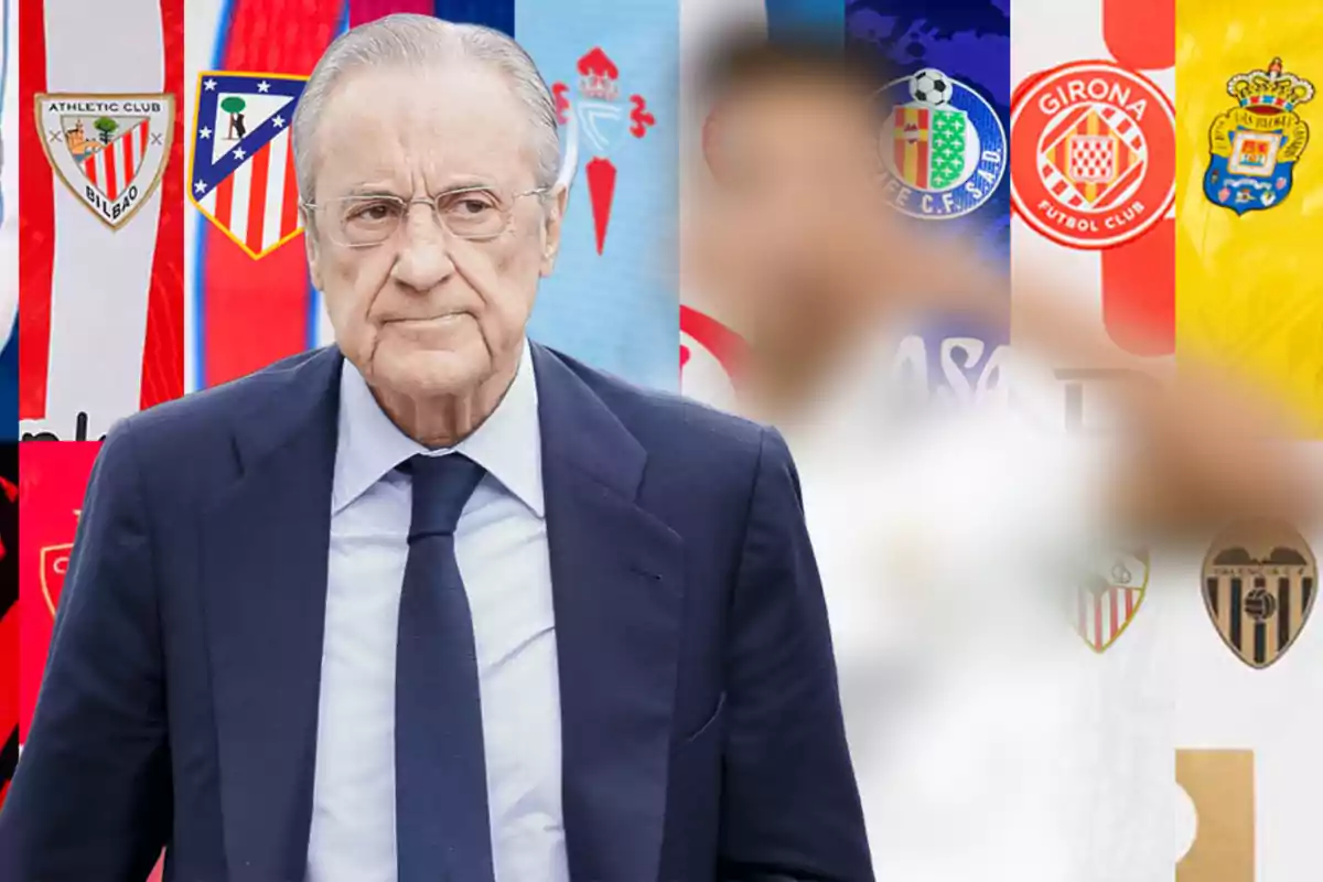 Hombre de cabello canoso y gafas con traje azul frente a un fondo de escudos de equipos de fútbol españoles