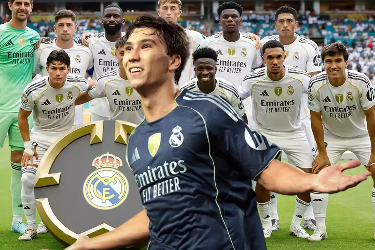 Real Madrid player celebrating in front while the team poses for the official photo at the stadium