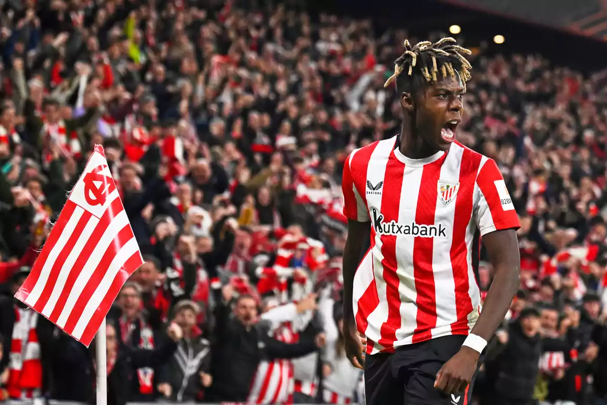 Athletic Club player celebrating a goal near the corner flag with the fans cheering in the stadium Athletic Club player celebrating a goal near the corner flag with the fans cheering in the stadium