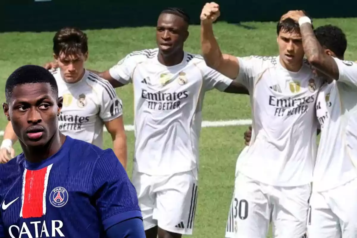 Real Madrid players celebrate on the field while a PSG player appears in the foreground looking to the left. Real Madrid players celebrate on the field while a PSG player appears in the foreground looking to the left.