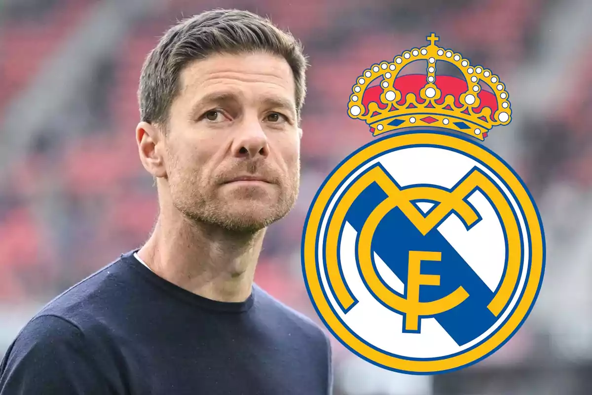 Hombre de cabello corto con expresión seria junto al escudo del Real Madrid