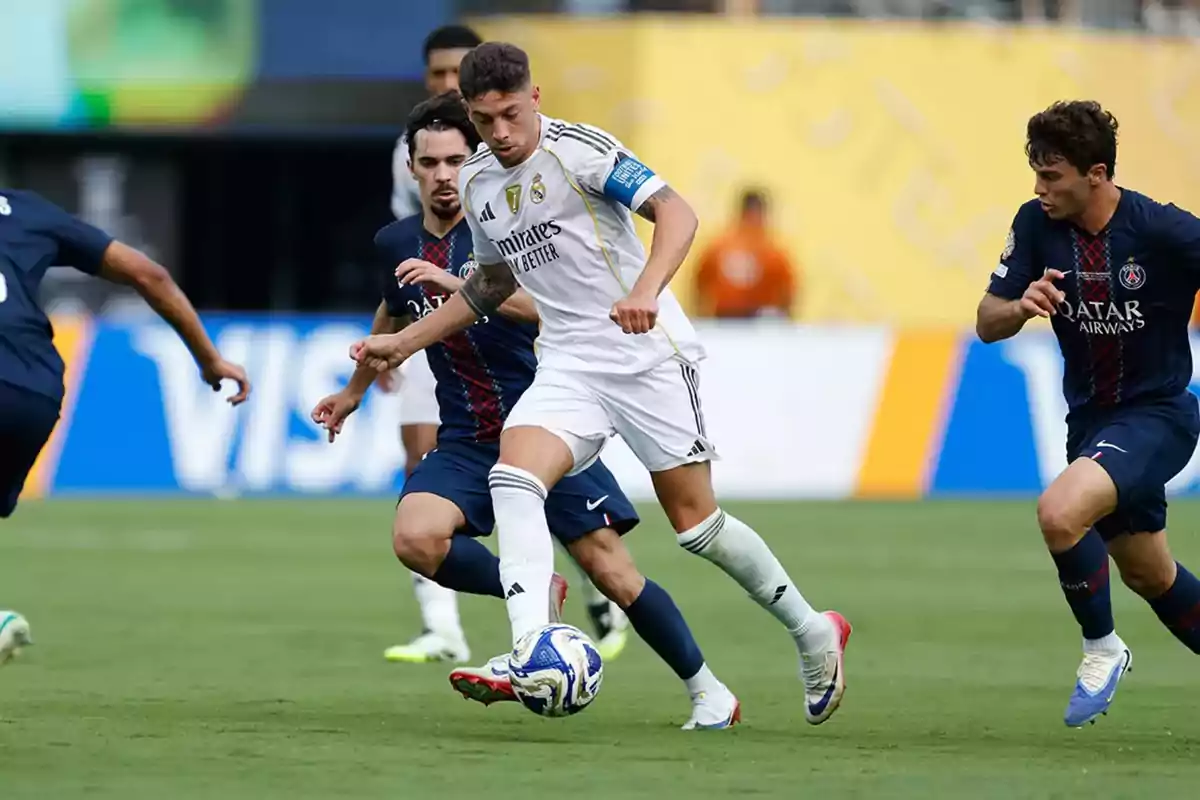 Real Madrid player controls the ball while being chased by PSG players during a match. Real Madrid player controls the ball while being chased by PSG players during a match.