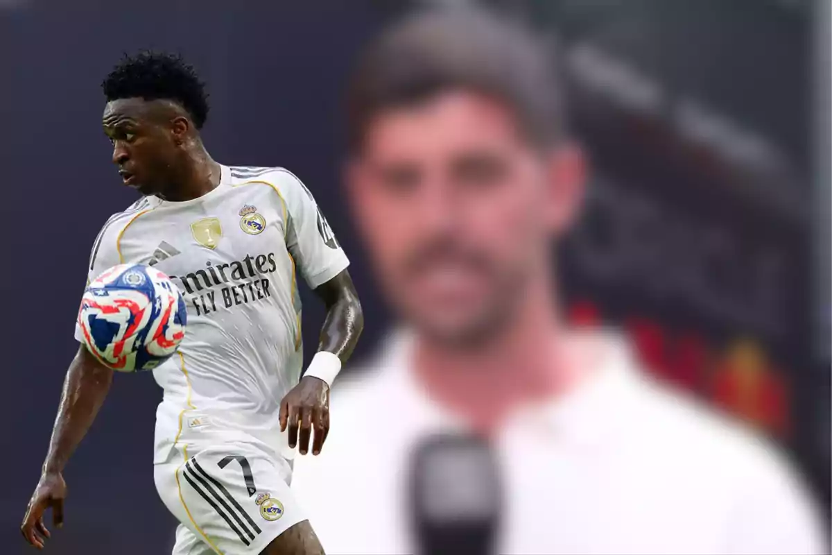 Real Madrid player controlling a ball with his chest while a blurred person holding a microphone appears in the background.