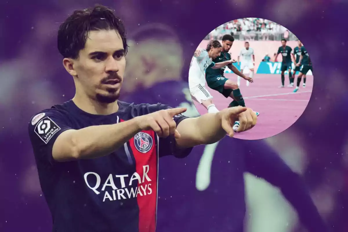 PSG player pointing with both hands while a play between players from two teams is shown in the background at a stadium