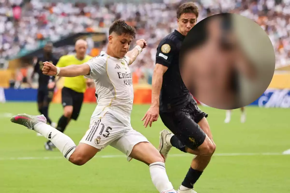 Two players compete for the ball during a match while part of the image is covered by a blurry circle.