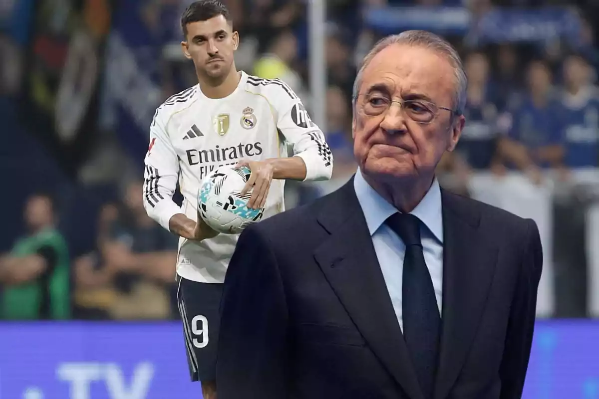 Un futbolista del Real Madrid con uniforme blanco sostiene un balón mientras un hombre mayor con traje oscuro aparece en primer plano con expresión seria en un estadio lleno de público.