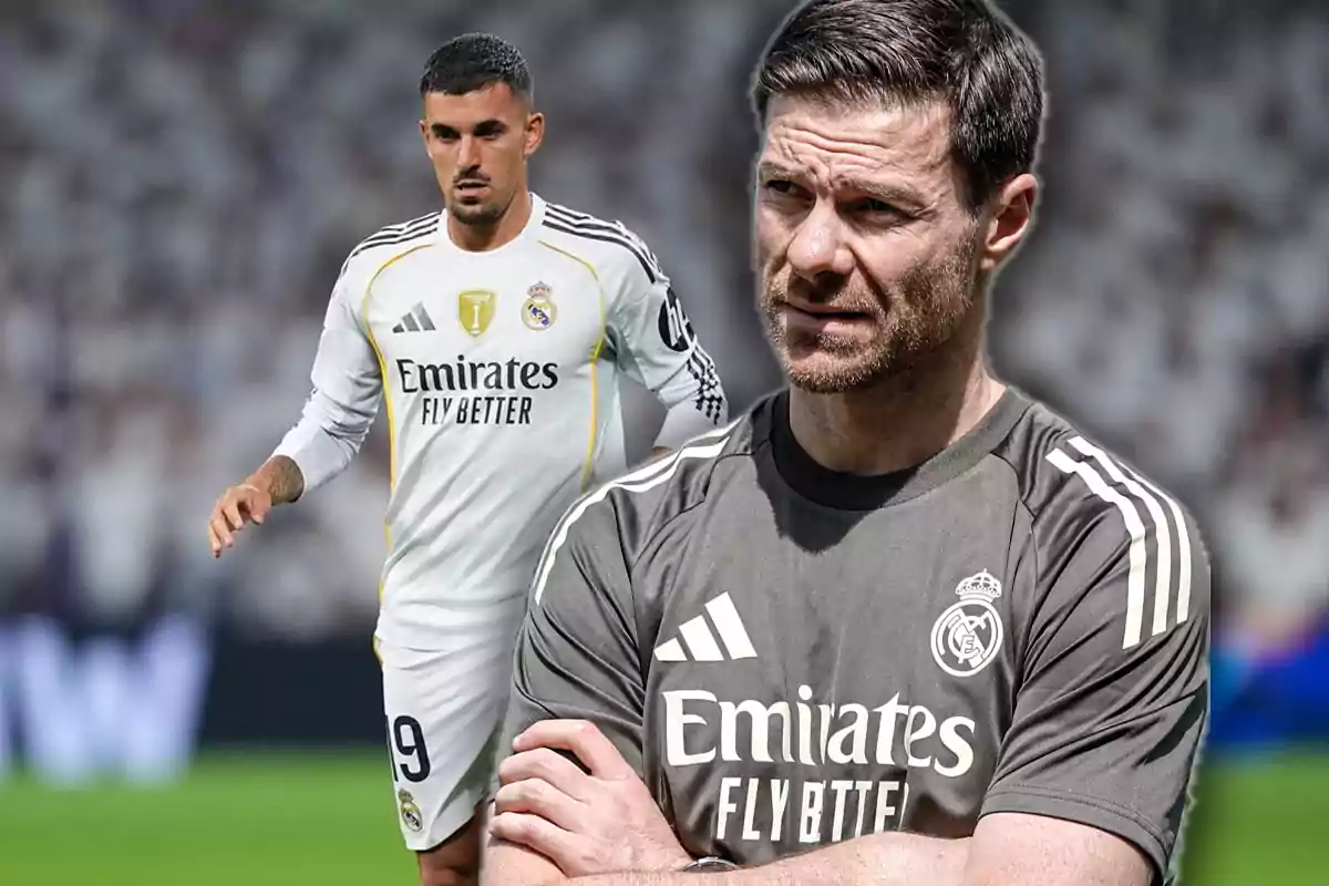 Two people wearing Real Madrid uniforms, one in a white jersey and the other in a gray jersey, in a soccer stadium.