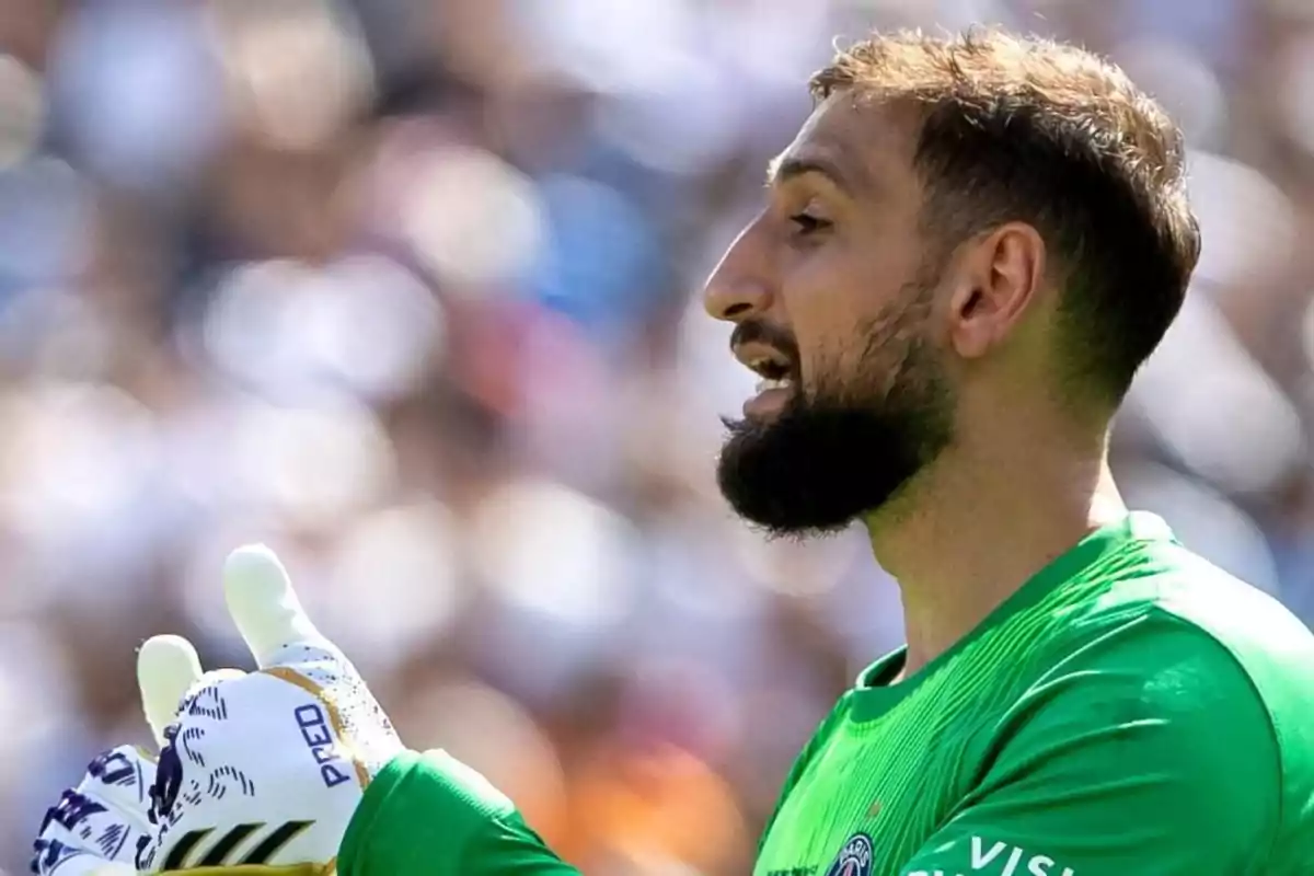 Bearded soccer goalkeeper with white gloves wearing a green uniform during a match Bearded soccer goalkeeper with white gloves wearing a green uniform during a match