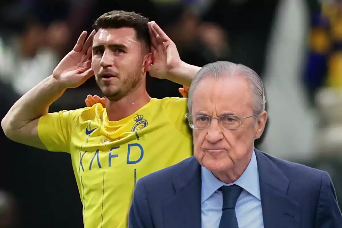 A player in a yellow uniform celebrates by putting his hands to his ears while an older man with glasses and a suit appears in the foreground with a serious expression.