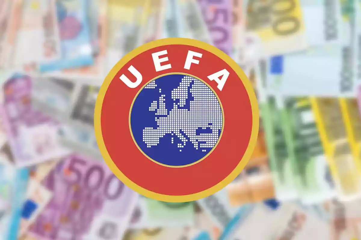 Logo de la UEFA sobre un fondo de billetes de euro desenfocados