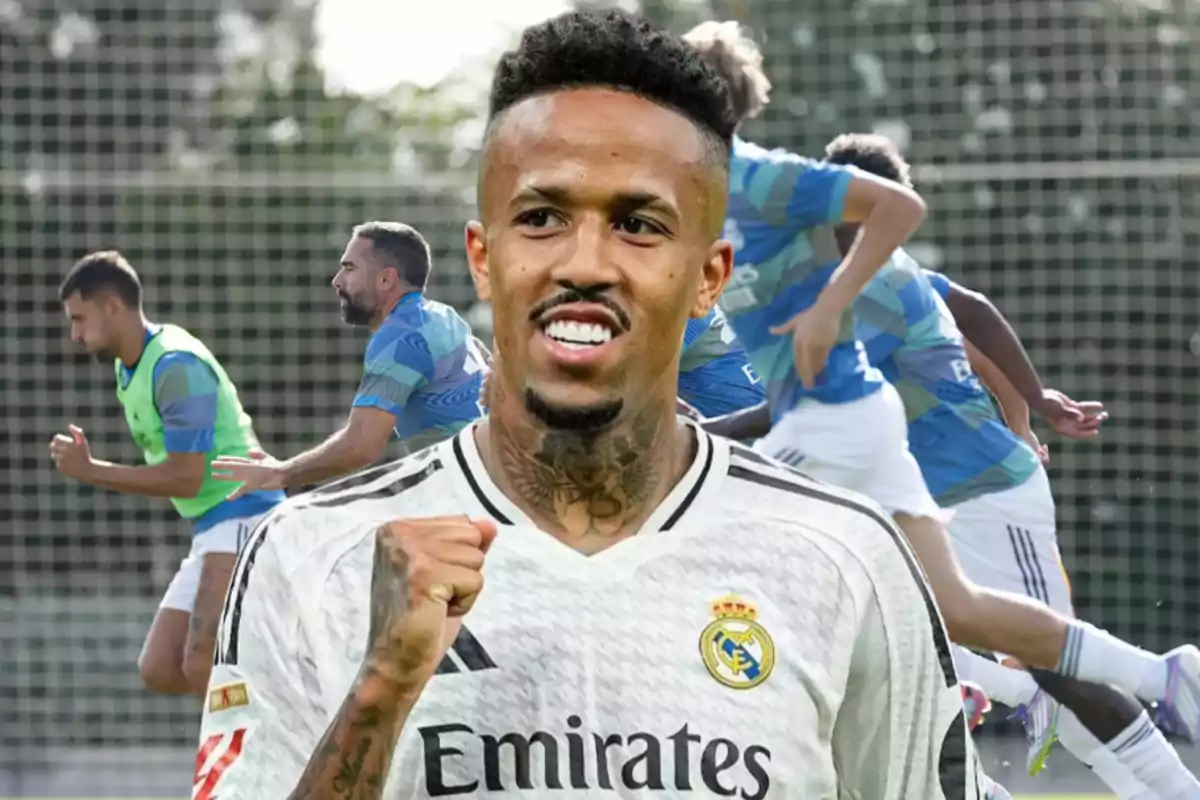 Real Madrid player celebrating with teammates training in the background