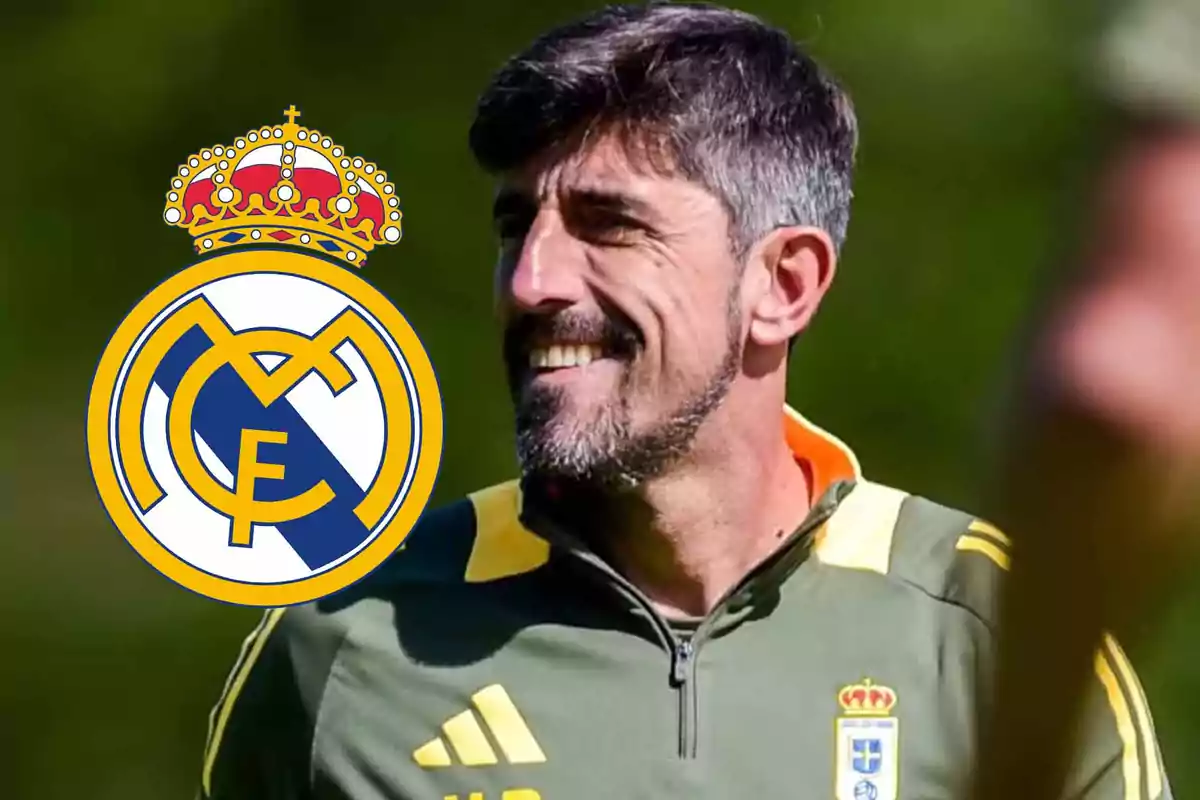 Smiling man with a beard and short hair wearing a green sports uniform with yellow details and the Real Madrid crest on his left side