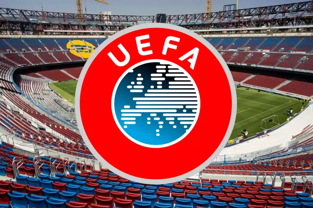UEFA logo in the foreground over an empty soccer stadium with red and blue stands