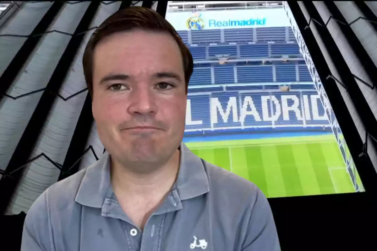 Man wearing a gray polo jersey in front of an image of the Real Madrid stadium