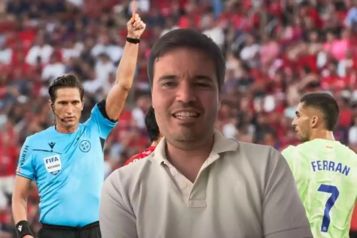 A smiling man in the foreground with a soccer referee showing a red card and players in the background of a stadium full of spectators