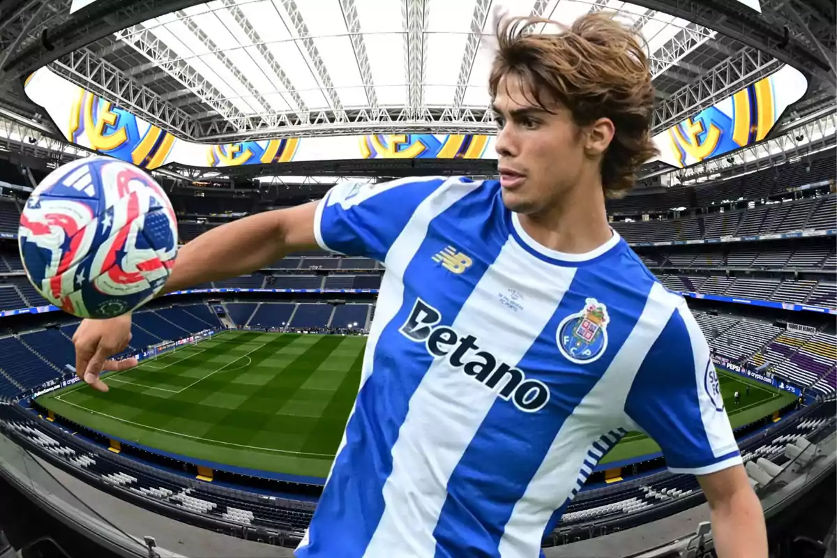 Soccer player in a Porto uniform controlling a ball in a modern, empty stadium