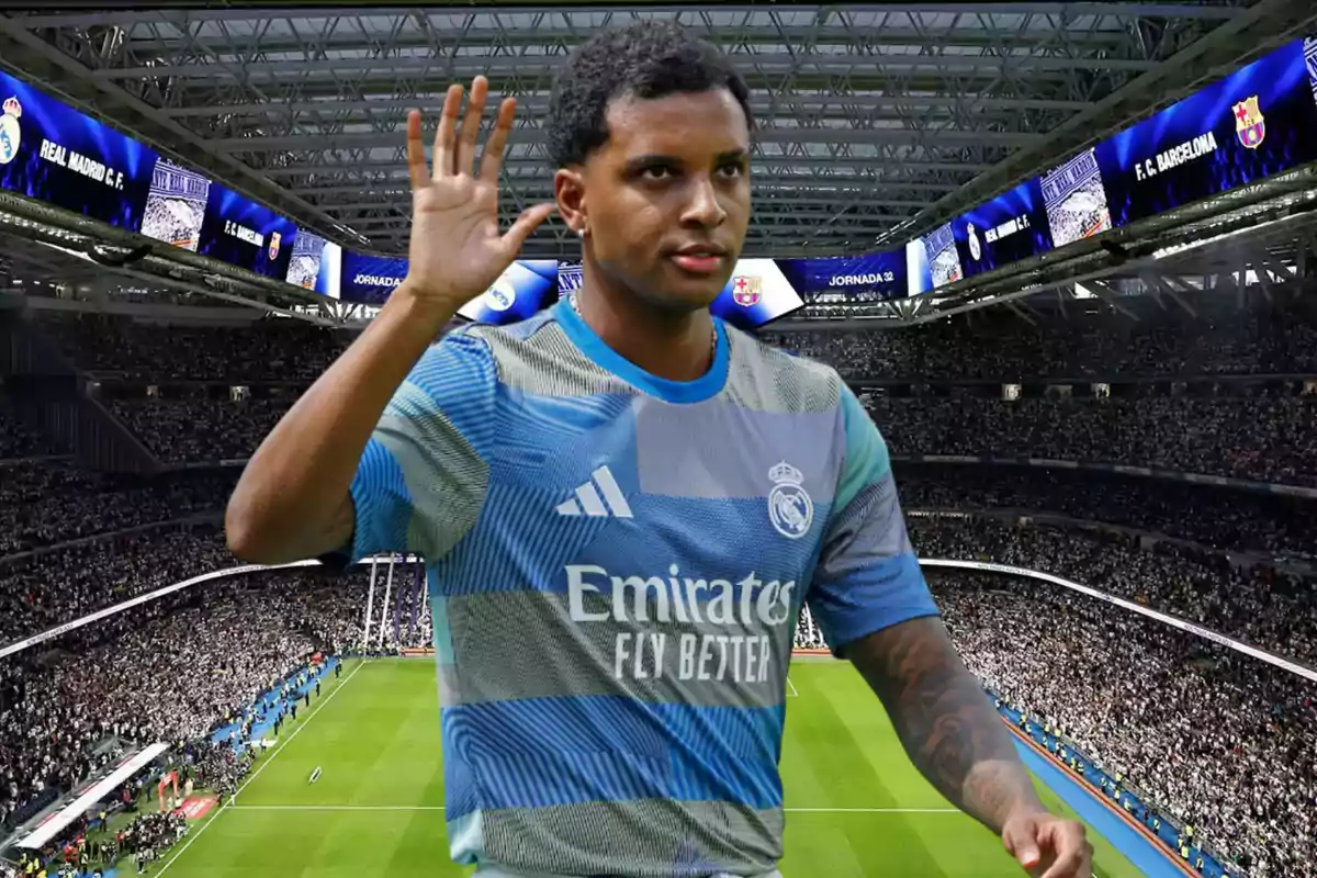 Soccer player in a Real Madrid uniform waving in a packed stadium during an important match