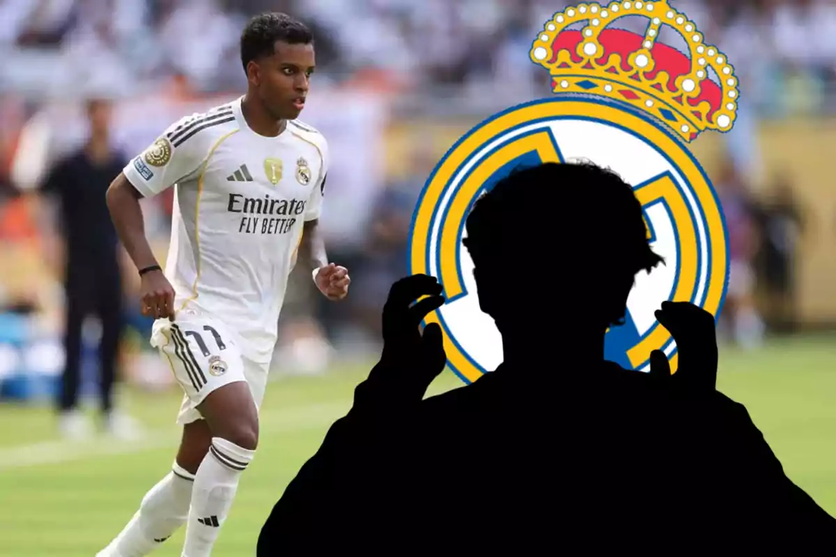 Futbolista del Real Madrid en el campo con el escudo del club y la silueta de una persona en primer plano