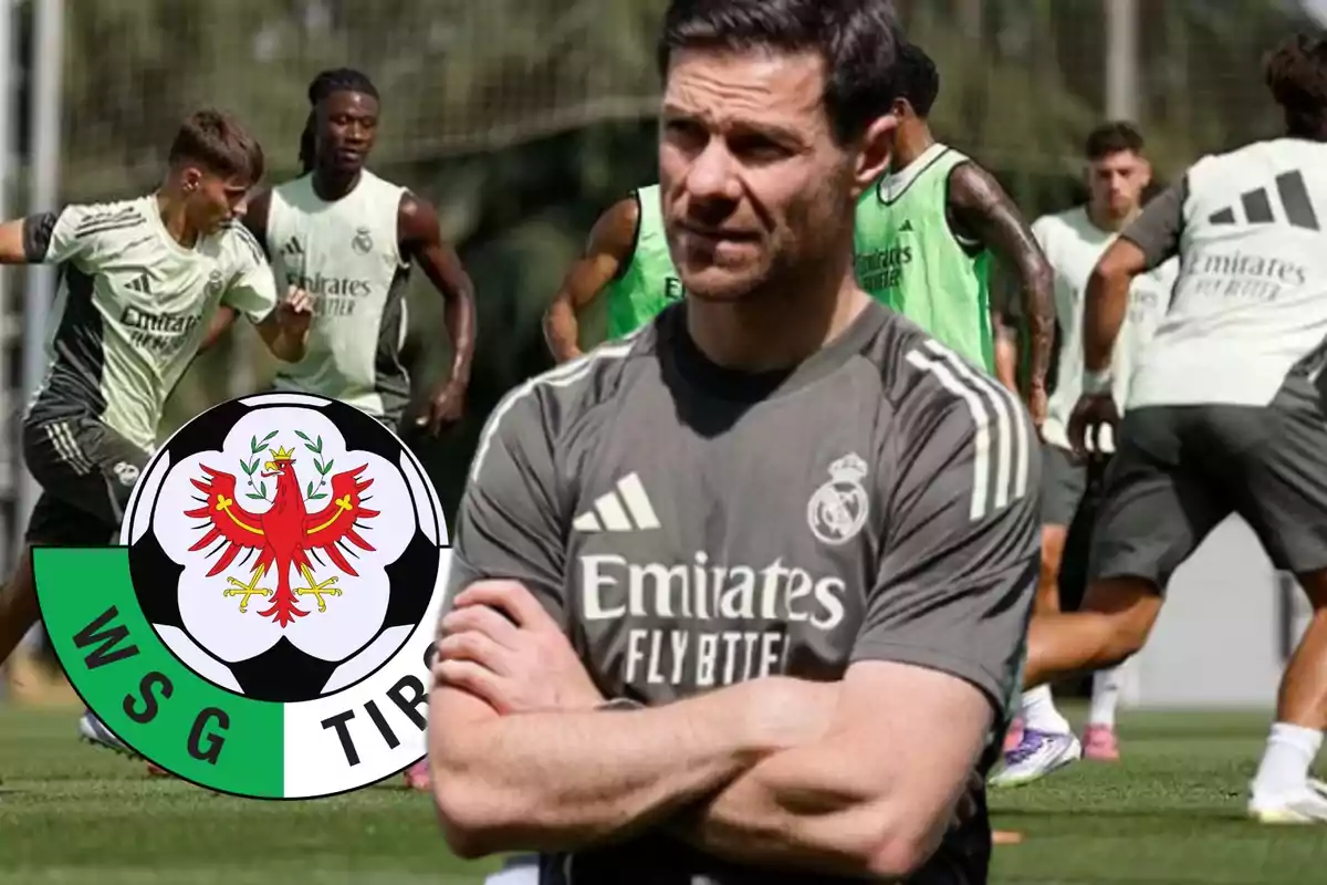Real Madrid coach watching his players during a practice with the WSG Tirol crest in the foreground