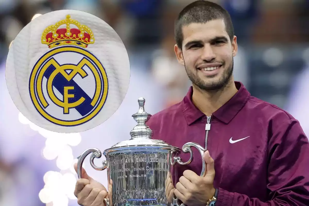 A smiling tennis player holds a trophy while the Real Madrid crest appears in the corner.