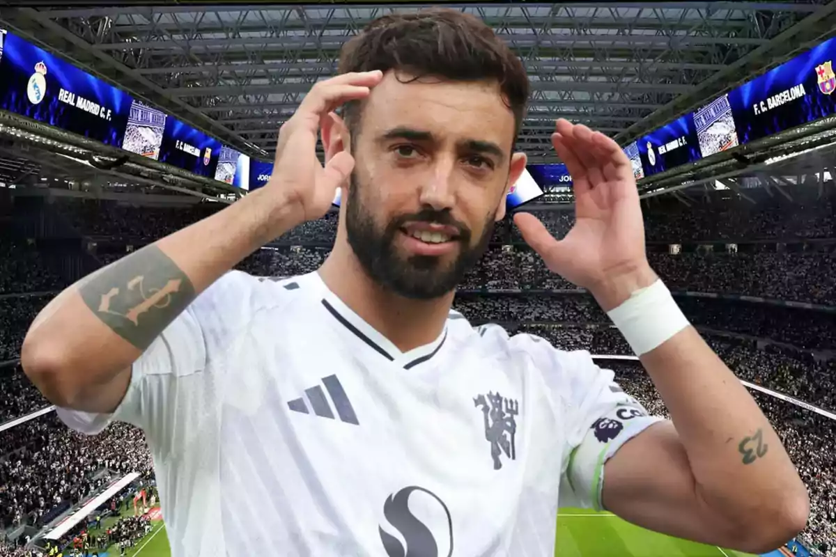 Bearded player in a white jersey celebrating in a stadium full of fans