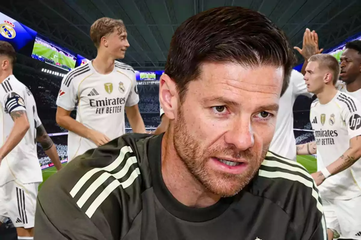 Soccer coach in the foreground with Real Madrid players celebrating in the stadium in the background