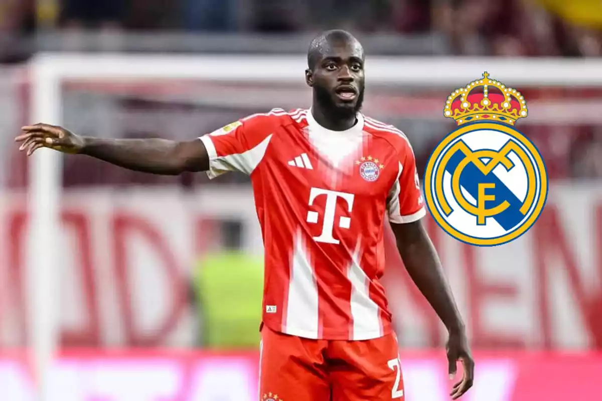 Bayern Munich player on the field with the Real Madrid crest next to him Bayern Munich player on the field with the Real Madrid crest next to him