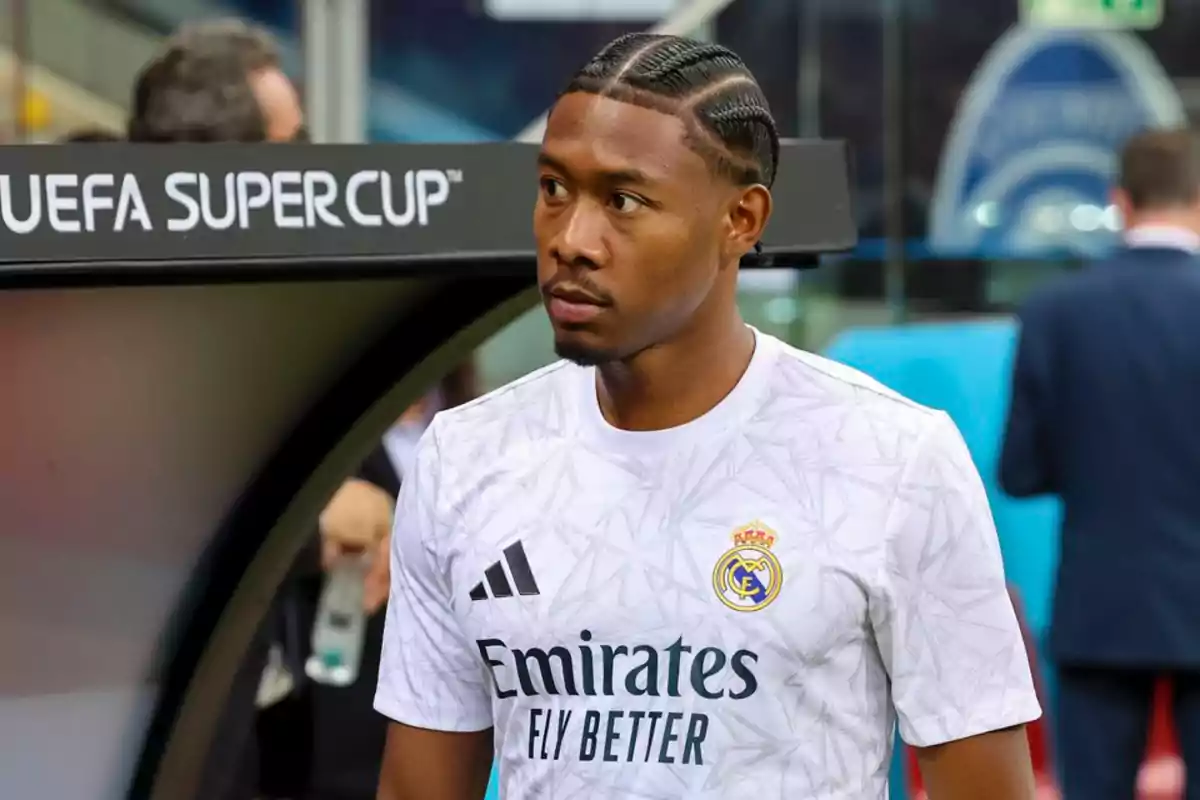 Real Madrid soccer player in a white jersey during the UEFA Super Cup. Real Madrid soccer player in a white jersey during the UEFA Super Cup.