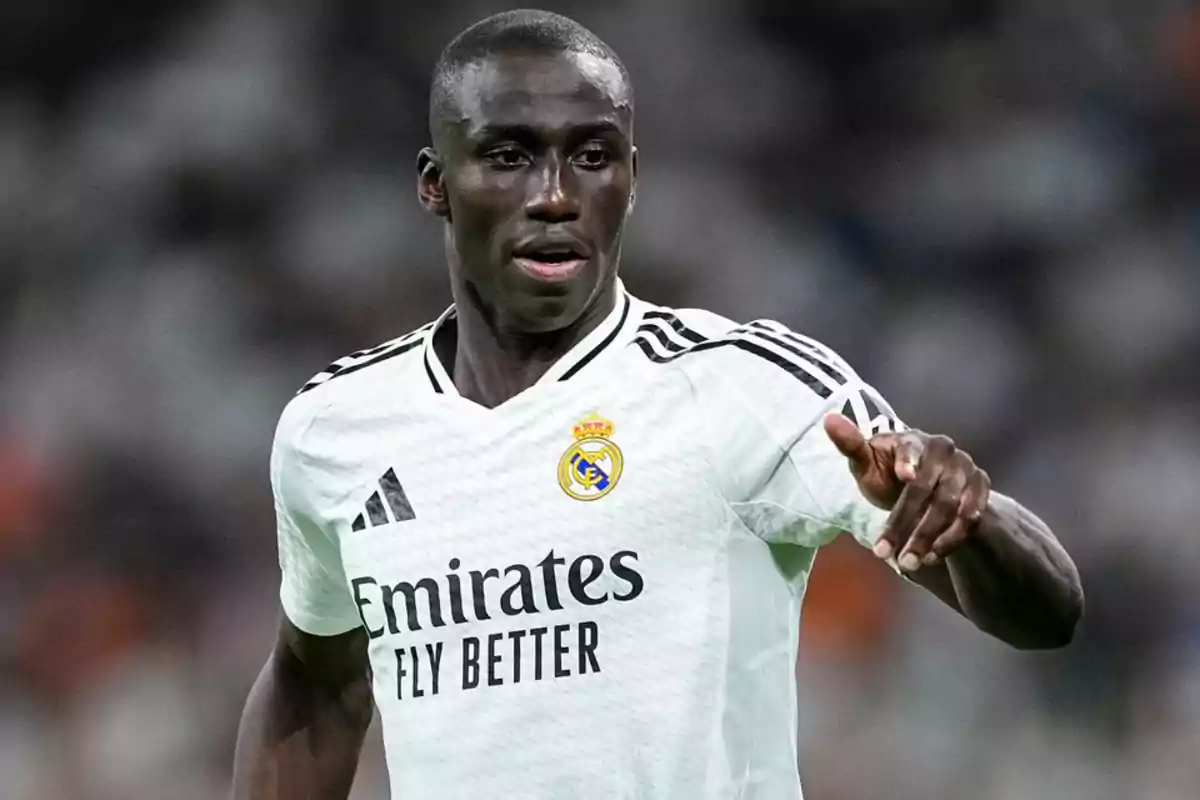 Real Madrid soccer player in action during a match. Real Madrid soccer player in action during a match.