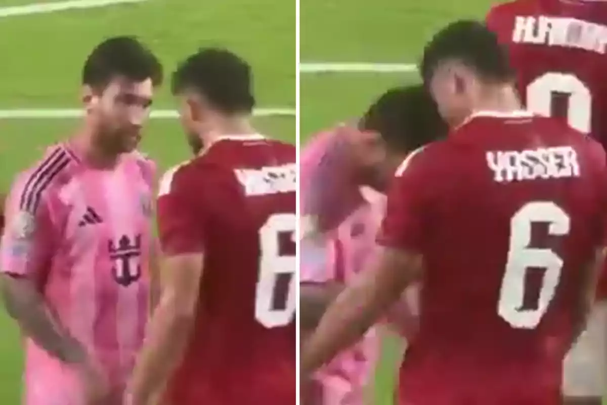 Dos futbolistas se encaran en el campo durante un partido uno viste uniforme rosa y el otro uniforme rojo con el número 6 y el nombre Yasser en la espalda