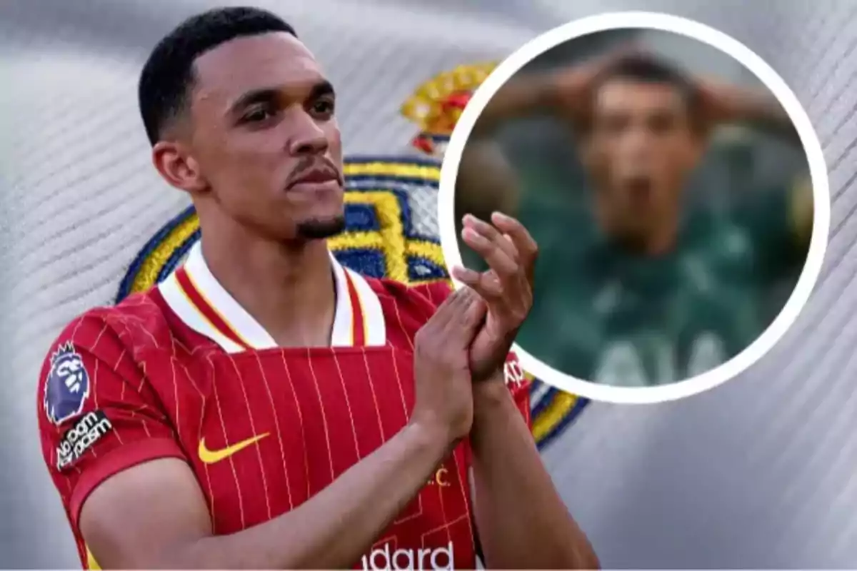 A soccer player in a red uniform applauds while a shield and a blurred image of another player can be seen in the background.