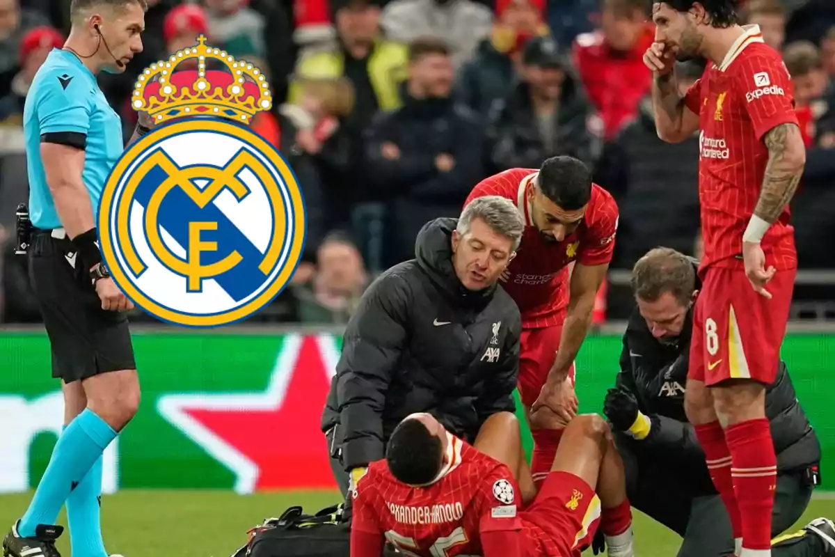 A player from the team in red uniform is being attended to by the medical staff on the field while a referee watches, and the Real Madrid logo is overlaid on the image.