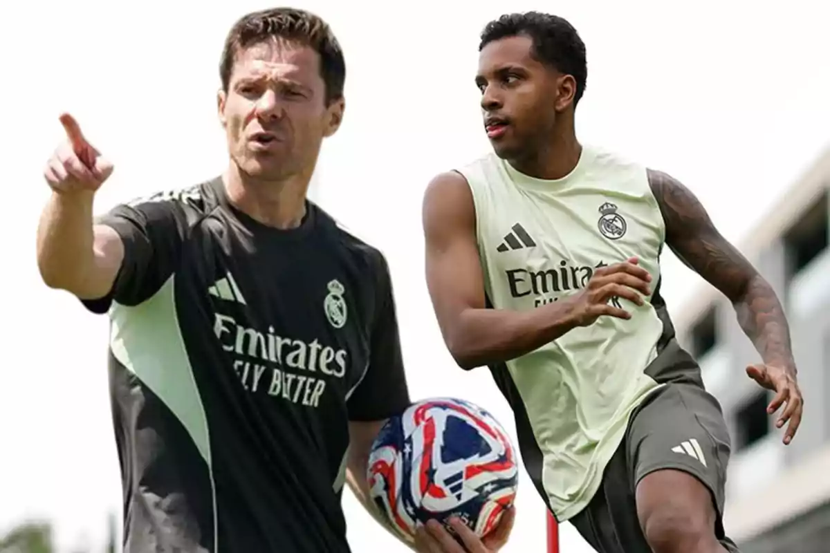 Dos personas con uniforme de entrenamiento del Real Madrid, una de ellas sostiene un balón y señala mientras la otra parece estar en movimiento durante una práctica.