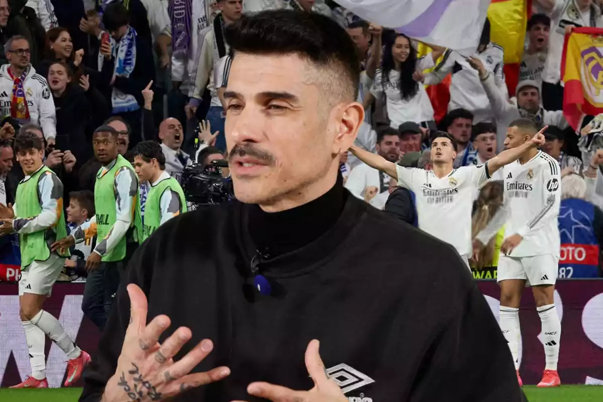 A man with a mustache and tattoos on his hands is in the foreground, while in the background, players and fans are celebrating in a stadium.