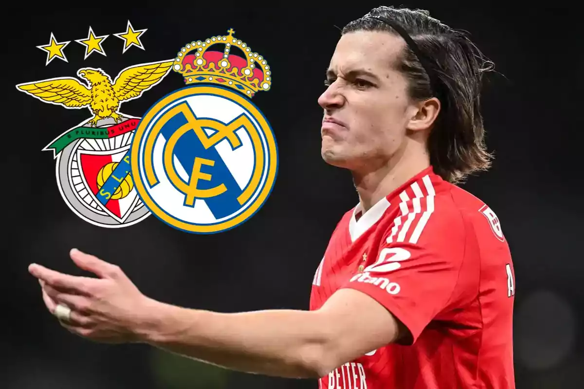 Futbolista del Benfica con gesto serio y los escudos del Benfica y Real Madrid al fondo